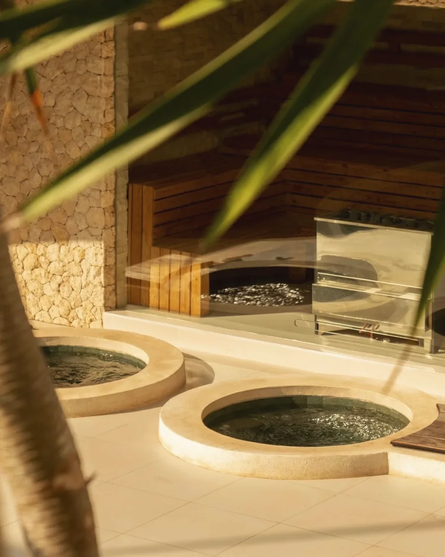 The plunge pools and sauna in the late afternoon light