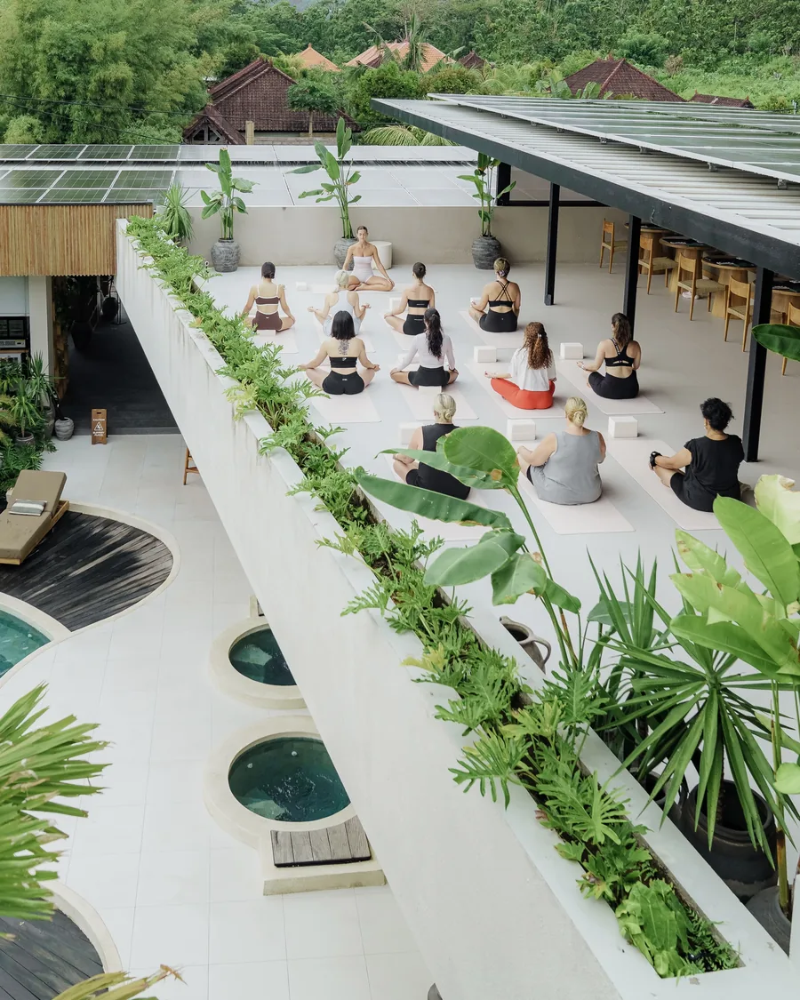 Morning practice on the rooftop, seen from above the hotel