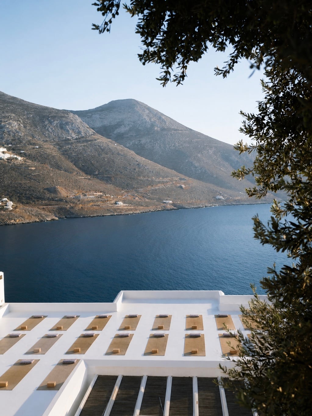 Bloom in Greece — rooftop yoga mats overlooking the Aegean on Amorgos